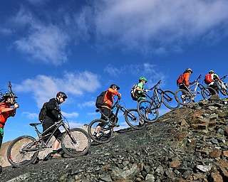 Mountainbiker Climbing